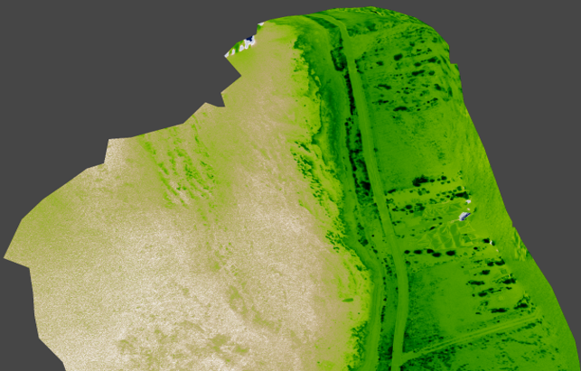The photo shows a picture from above with a green area highlighted.